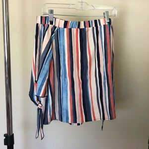 Woman’s off the shoulder top.